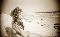 And she placed a wreath in her hair.